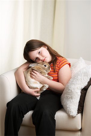simsearch:700-01236595,k - Portrait of Girl Holding Rabbit Stock Photo - Rights-Managed, Code: 700-01236572