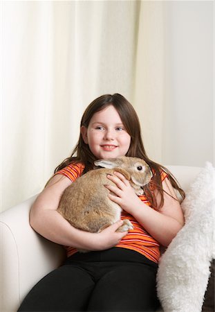 simsearch:700-01236595,k - Portrait of Girl Holding Rabbit Stock Photo - Rights-Managed, Code: 700-01236573