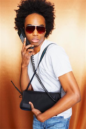 simsearch:700-06701841,k - Man Talking on Retro Cell Phone Stock Photo - Rights-Managed, Code: 700-01248373