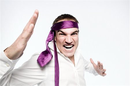 Businessman with Tie as Headband Stock Photo - Rights-Managed, Code: 700-01248392