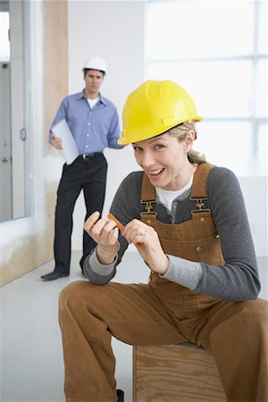 slacker - Man and Woman on Construction Site Stock Photo - Rights-Managed, Code: 700-01248648