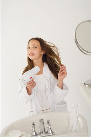 simsearch:700-01248703,k - Girl Drying Hair Stock Photo - Rights-Managed, Code: 700-01248697