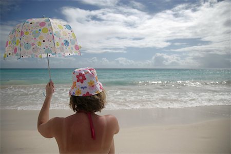 simsearch:700-02913016,k - Woman on Beach Holding Umbrella Stock Photo - Rights-Managed, Code: 700-01249047