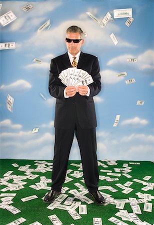 sky's the limit - Money Raining Down on Businessman Stock Photo - Rights-Managed, Code: 700-01260297