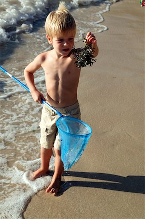 photos of little boy fishing - Boy With Fishing Net Stock Photo - Rights-Managed, Code: 700-01260408