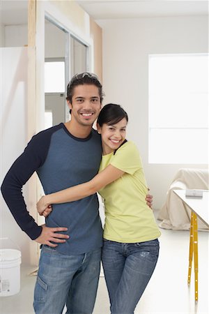 Man and Woman Decorating Home Foto de stock - Con derechos protegidos, Código: 700-01260521