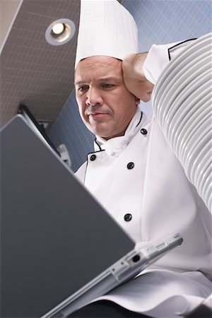 simsearch:700-00523344,k - Chef Using Laptop Stock Photo - Rights-Managed, Code: 700-01275242
