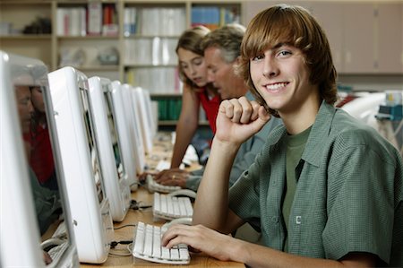 simsearch:400-05697169,k - Portrait of Student in Computer Lab Stock Photo - Rights-Managed, Code: 700-01275955