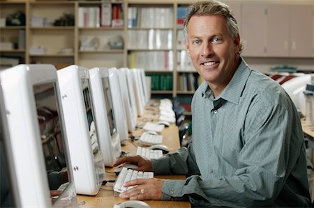 simsearch:600-02973192,k - Portrait of Man in Computer Lab Stock Photo - Rights-Managed, Code: 700-01275957