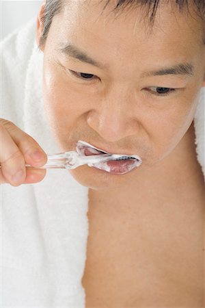 simsearch:700-00350110,k - Man Brushing Teeth Stock Photo - Rights-Managed, Code: 700-01276264