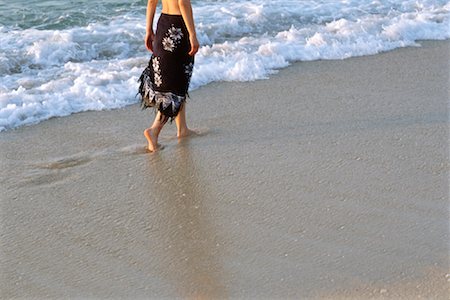 simsearch:700-00085279,k - Woman Walking on Beach Stock Photo - Rights-Managed, Code: 700-01295721