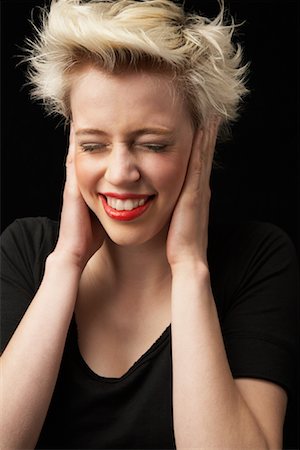 Woman Covering Ears Stock Photo - Rights-Managed, Code: 700-01296560