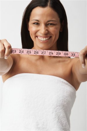 simsearch:700-01200269,k - Woman Holding Measuring Tape Foto de stock - Con derechos protegidos, Código: 700-01296618
