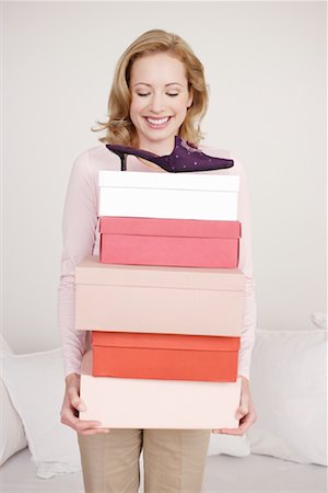 simsearch:700-01344535,k - Woman Holding Shoeboxes Stock Photo - Rights-Managed, Code: 700-01344529