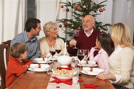 Family Sitting at Table Stock Photo - Rights-Managed, Code: 700-01344969