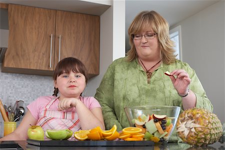 Mother and Daughter Making Fruit Salad Stock Photo - Rights-Managed, Code: 700-01345022