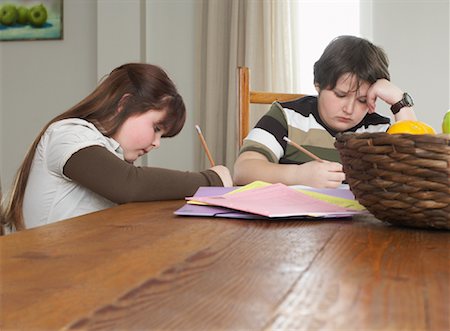 simsearch:700-01345033,k - Children doing Homework at Kitchen Table Stock Photo - Rights-Managed, Code: 700-01345036