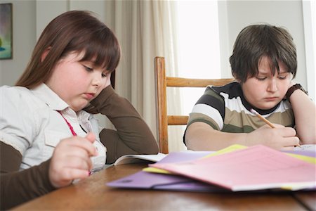 simsearch:700-01345033,k - Children doing Homework at Kitchen Table Stock Photo - Rights-Managed, Code: 700-01345030