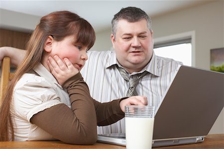 Father and Daughter with Laptop Computer Stock Photo - Rights-Managed, Code: 700-01345049