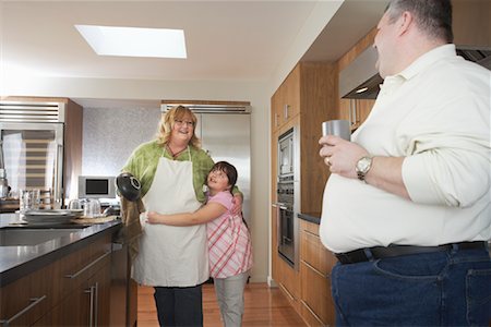 Parents in Kitchen with Daughter Stock Photo - Rights-Managed, Code: 700-01345075
