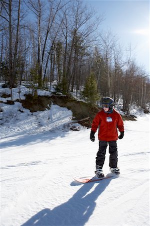 Child Snowboarding, Collingwood, Ontario, Canada Stock Photo - Rights-Managed, Code: 700-01378629