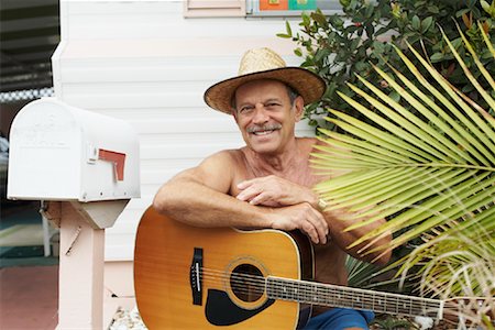 Portrait of Man with Guitar Stock Photo - Rights-Managed, Code: 700-01429159