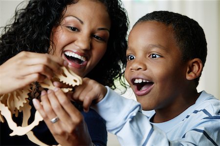 simsearch:700-01236595,k - Mother and Son Playing with Dinosaur Model Stock Photo - Rights-Managed, Code: 700-01519694