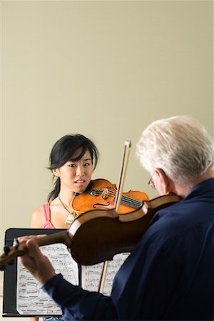 simsearch:640-01365707,k - Girl Taking Violin Lesson Stock Photo - Rights-Managed, Code: 700-01540861