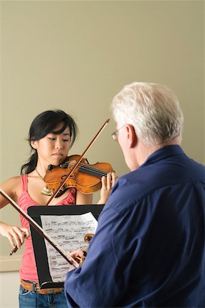 simsearch:640-01365707,k - Girl Taking Violin Lesson Stock Photo - Rights-Managed, Code: 700-01540862