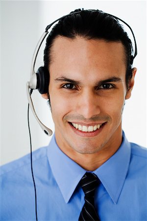 simsearch:700-01248091,k - Businessman Wearing Headset Stock Photo - Rights-Managed, Code: 700-01541071