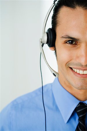 simsearch:700-01248091,k - Businessman Wearing Headset Stock Photo - Rights-Managed, Code: 700-01541072