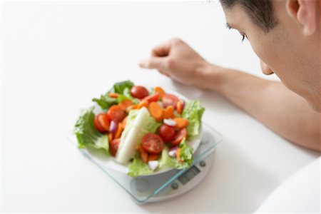 simsearch:700-03053816,k - Man Weighing Salad on Scale Stock Photo - Rights-Managed, Code: 700-01575405