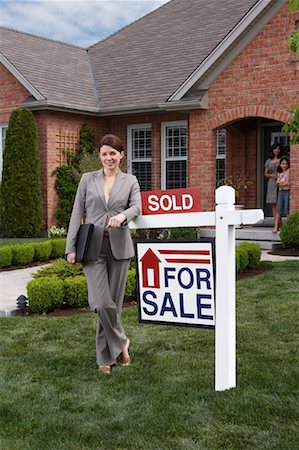 simsearch:700-02047006,k - Real Estate Agent by Sold Sign Stock Photo - Rights-Managed, Code: 700-01571947