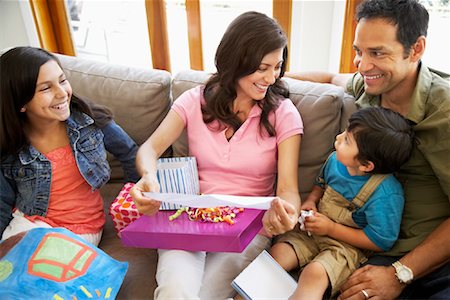 Mother Opening Presents with Family Stock Photo - Rights-Managed, Code: 700-01572057