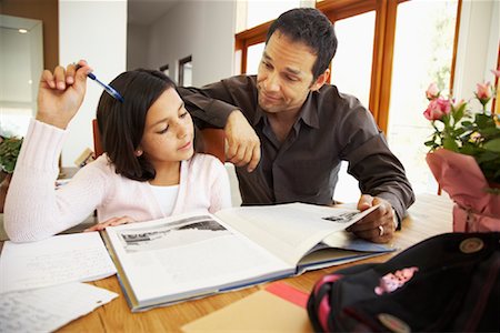 simsearch:700-01345037,k - Father Helping Daughter with Homework Foto de stock - Con derechos protegidos, Código: 700-01572105