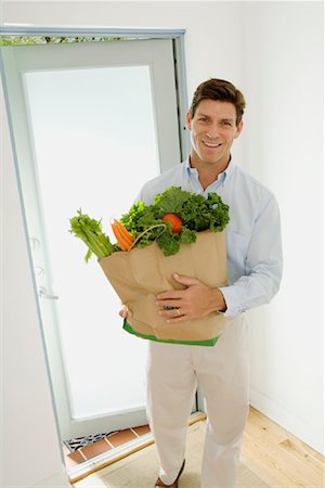 eco friendly home - Man Holding Bag of Groceries Stock Photo - Rights-Managed, Code: 700-01586068