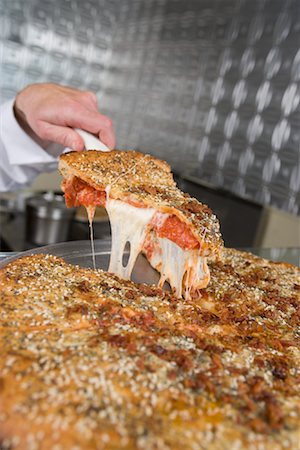 Hand Taking Slice from Pizza Stock Photo - Rights-Managed, Code: 700-01586106