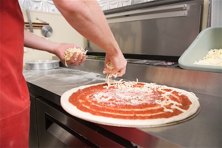Man Preparing Pizza Stock Photo - Rights-Managed, Code: 700-01586102