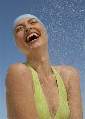 simsearch:649-05819761,k - Woman Showering Outdoors Stock Photo - Rights-Managed, Code: 700-01587333