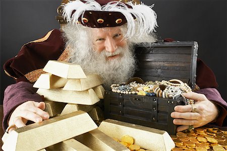 possessive - King With His Treasure Stock Photo - Rights-Managed, Code: 700-01582214