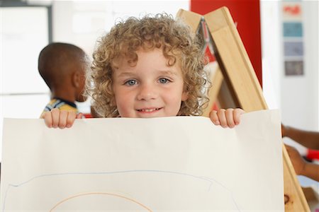 simsearch:700-01295913,k - Boy Showing Artwork at Daycare Stock Photo - Rights-Managed, Code: 700-01593797