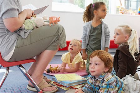 Children Hearing Story at Daycare Stock Photo - Rights-Managed, Code: 700-01593827