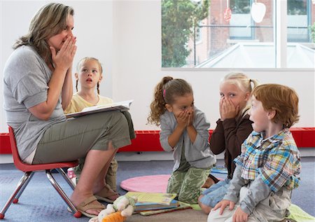 Children Hearing Story at Daycare Stock Photo - Rights-Managed, Code: 700-01593828