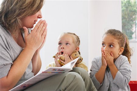 Children Hearing Story at Daycare Stock Photo - Rights-Managed, Code: 700-01593829