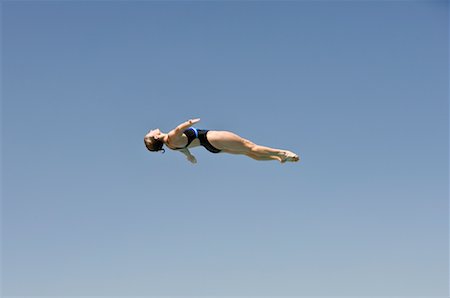 simsearch:700-00091923,k - Woman Springboard Diving Stock Photo - Rights-Managed, Code: 700-01607351