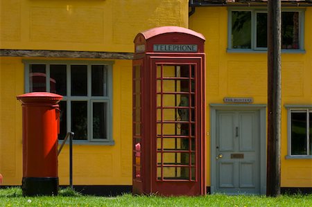 red call box - Phone Booth by House, Acton, Suffolk, England Stock Photo - Rights-Managed, Code: 700-01615166
