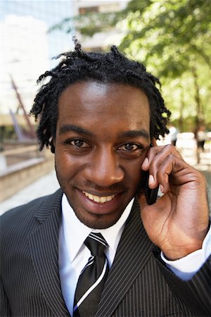 dreadlocks on african americans - Businessman Talking on Cellular Phone Stock Photo - Rights-Managed, Code: 700-01615229