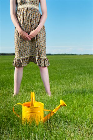 simsearch:700-01633321,k - Woman With Watering Can Stock Photo - Rights-Managed, Code: 700-01633318