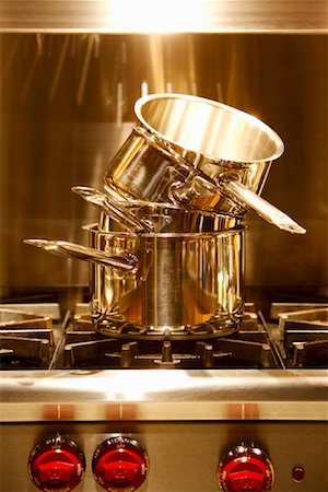 Stacked Pots on Gas Stove Stock Photo - Rights-Managed, Code: 700-01646222