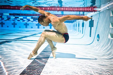 Man Dancing Underwater Stock Photo - Rights-Managed, Code: 700-01670875